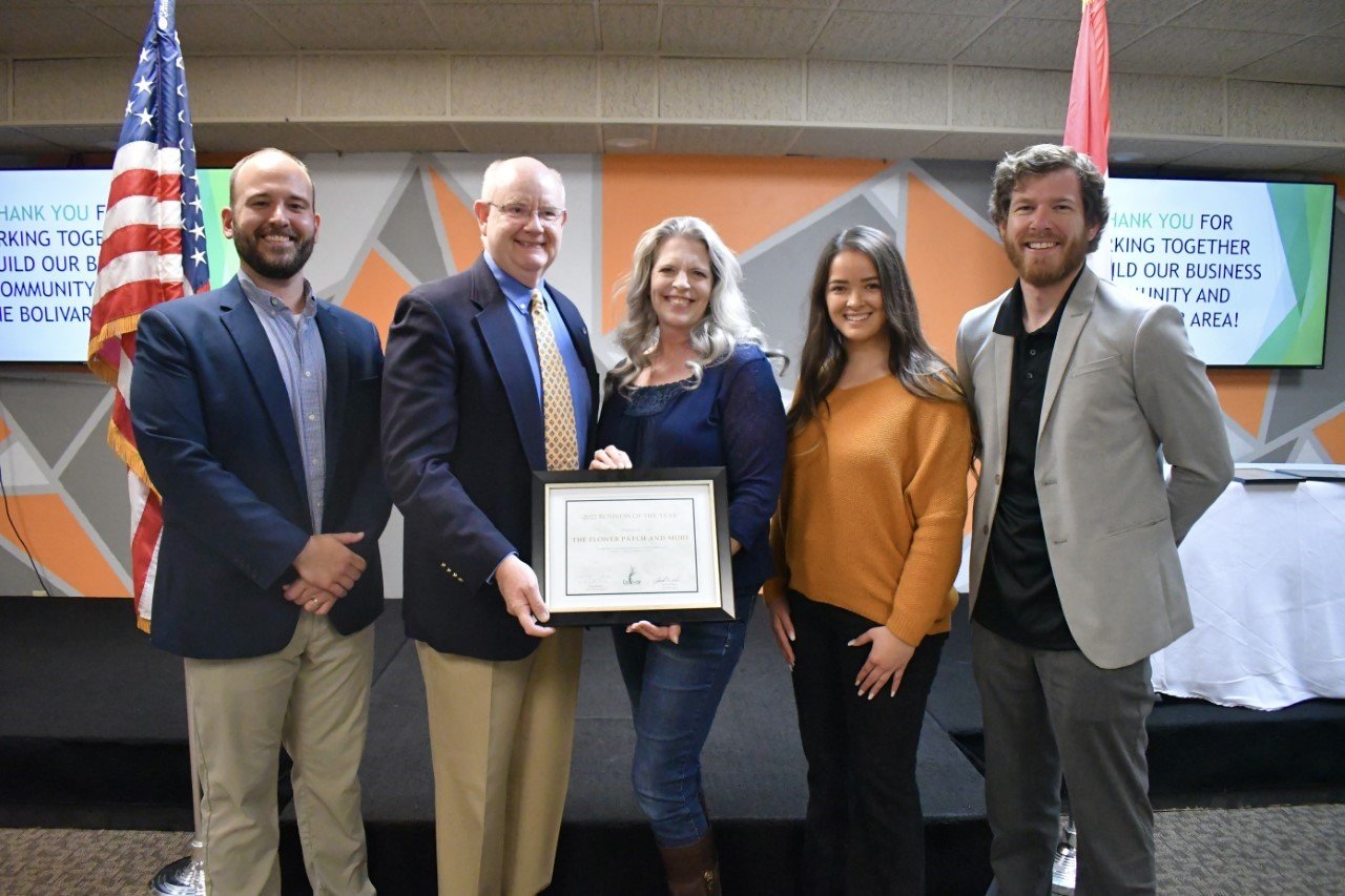From left, chamber President Paul Folbre; Craig Lehman of Shelter Insurance, the 2021 business of the year; Kelly Coffey and Ema Wells of The Flower Patch & More; and chamber Vice President Jacob Wilson celebrate the florist’s 2022 business of the year award at the chamber's annual meeting this month.